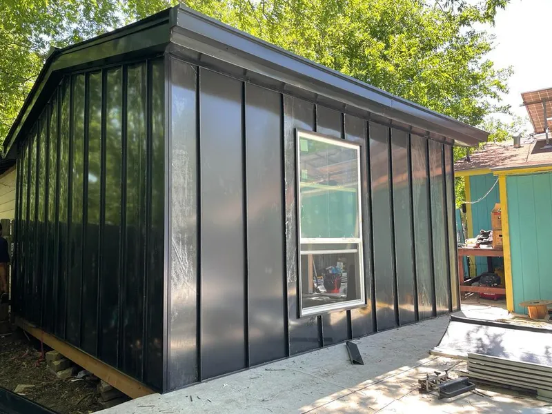 Black standing seam metal wall panels for Metal Roof Installation in Hebron